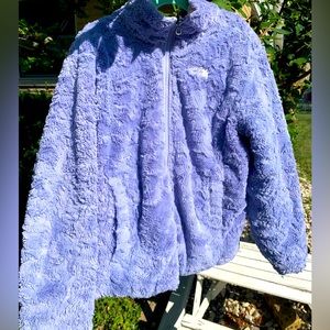 The North Face reversible floral/lavender winter jacket. Gently used / Girl’s L